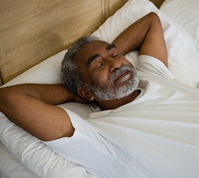 Man sleeping in bed