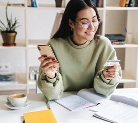 Woman using a credit card